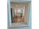 Bright kitchen featuring stainless steel appliances, granite countertops, and modern wood flooring at 3987 Maceachen Blvd # 132, Sarasota, FL 34233