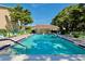 Community pool with plenty of lounge seating at 3987 Maceachen Blvd # 132, Sarasota, FL 34233