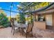 Enjoy the outdoors with the screened in patio, dining table, and outdoor kitchen, perfect for entertaining at 4468 White Egret Ln, Sarasota, FL 34238