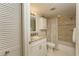 Bathroom with tiled shower and tub combination at 4734 Independence Dr # 4734, Bradenton, FL 34210