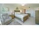 Bedroom with a large window, comfy chair, and closet at 4734 Independence Dr # 4734, Bradenton, FL 34210
