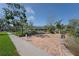 Brick patio seating area is surrounded by lush green grass at 4734 Independence Dr # 4734, Bradenton, FL 34210