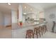 Modern kitchen boasts sleek countertops, white cabinetry, breakfast bar, and stylish decor at 4734 Independence Dr # 4734, Bradenton, FL 34210