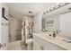 Bathroom with shower-tub combo and neutral-colored tile surround at 4920 Kestral Park Cir # 11, Sarasota, FL 34231