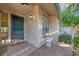 Charming front entrance featuring brick pavers, an accent bench, and lush landscaping for a welcoming curb appeal at 4920 Kestral Park Cir # 11, Sarasota, FL 34231