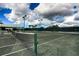 The on-site tennis court offers space to enjoy sports with friends and neighbors at 4920 Kestral Park Cir # 11, Sarasota, FL 34231