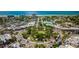 Gorgeous aerial view of a coastal town featuring verdant parks and beautiful beaches at 526 Bird Key Dr, Sarasota, FL 34236