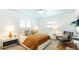 Comfortable bedroom with a cozy bed, stylish decor, and ample natural light, creating a relaxing space at 526 Bird Key Dr, Sarasota, FL 34236
