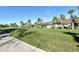 The back of these beautiful homes feature screened lanais with large grassy backyards and swaying palm trees at 5283 Chase Oaks Dr, Sarasota, FL 34241