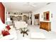 Airy living room with comfortable seating and an open floor plan to kitchen at 5283 Chase Oaks Dr, Sarasota, FL 34241