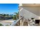 Balcony seating offers serene views of the beach and ocean, enhancing the coastal living experience at 535 Sanctuary Dr # A202, Longboat Key, FL 34228