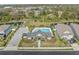 Aerial view of a community pool and clubhouse at 5404 Spanish Moss Cv, Bradenton, FL 34203