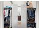 Walk-in closet with plenty of storage and view of bathroom vanity at 5537 Palmer Cir # 205, Lakewood Ranch, FL 34211