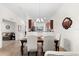 Inviting dining room leading into the kitchen and featuring a table with seating for six guests at 5537 Palmer Cir # 205, Lakewood Ranch, FL 34211