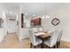 View of dining room and hallway leading to the kitchen area at 5537 Palmer Cir # 205, Lakewood Ranch, FL 34211