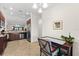 Interior view of kitchen with granite counters and a dining area at 5537 Palmer Cir # 205, Lakewood Ranch, FL 34211