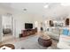 Comfortable living room next to the kitchen and dining areas at 5537 Palmer Cir # 205, Lakewood Ranch, FL 34211