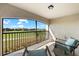 Inviting patio with comfortable seating offers scenic views of the golf course and community at 5537 Palmer Cir # 205, Lakewood Ranch, FL 34211