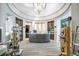The light and airy reception area features an open-concept design with luxury finishes and ample shelving at 5537 Palmer Cir # 205, Lakewood Ranch, FL 34211