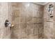 Close-up of tiled shower with soap dish and recessed shelving at 5537 Palmer Cir # 205, Lakewood Ranch, FL 34211