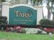 Attractive Tara Golf & Country Club entrance sign surrounded by colorful flowers and manicured greenery at 5712 Cottonwood St, Bradenton, FL 34203
