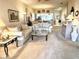 Spacious living room with comfortable sofas, a coffee table, and an open floor plan at 5712 Cottonwood St, Bradenton, FL 34203