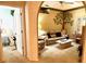 Cozy living room with a decorative tree on the wall at 5712 Cottonwood St, Bradenton, FL 34203