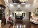 Grand lobby with high ceilings, a chandelier, elegant furnishings, and a reception area, providing a luxurious feel at 5712 Cottonwood St, Bradenton, FL 34203