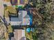 Stunning aerial view of the property, highlighting the backyard pool, patio, and landscaping at 604 68Th Avenue W Dr, Bradenton, FL 34207