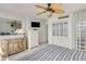 Bedroom with tiled flooring, large mirror, and a closet at 7000 Beach Plz # 905, St Pete Beach, FL 33706