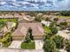 Aerial view highlighting the property's well-manicured lawn and proximity to other homes at 7123 Heron Dr, Sarasota, FL 34243