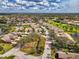 Aerial view of the community showcasing the home's location amidst lush landscaping and serene surroundings at 7123 Heron Dr, Sarasota, FL 34243