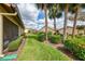 Well-maintained exterior with lush landscaping, providing privacy and curb appeal at 7123 Heron Dr, Sarasota, FL 34243