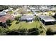 An aerial shot showcasing a spacious backyard with a patio area, perfect for outdoor dining at 7208 13Th W Ave, Bradenton, FL 34209