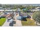 Aerial view of the home in a neighborhood setting with mature trees and landscaping at 7807 24Th W Ave, Bradenton, FL 34209