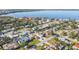 Aerial view of a charming residential neighborhood with homes near a scenic body of water at 7807 24Th W Ave, Bradenton, FL 34209