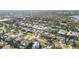 Aerial shot of homes in a neighborhood with tree-lined streets and well-maintained lawns at 7807 24Th W Ave, Bradenton, FL 34209