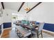 Elegant dining room featuring a dark wood table, stylish seating, and modern light fixture at 7807 24Th W Ave, Bradenton, FL 34209