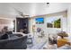Cozy living room showcasing stylish decor, comfortable seating, and large windows for lots of natural light at 7807 24Th W Ave, Bradenton, FL 34209