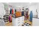 Spacious walk-in closet with custom shelving, ample storage, and a center island for organization at 7807 24Th W Ave, Bradenton, FL 34209
