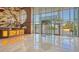 Expansive lobby with high ceilings, marble floors, and a grand entrance at 990 Blvd Of The Arts # 1203, Sarasota, FL 34236