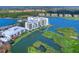 Aerial view of waterfront community with beautiful views of the area's lakes and golf courses at 10520 Boardwalk Loop # 205, Lakewood Ranch, FL 34202