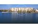 Expansive waterfront condos boasting serene lake views surrounded by mature tropical landscaping at 10520 Boardwalk Loop # 205, Lakewood Ranch, FL 34202