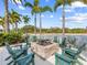 Cozy fire pit area with comfortable seating, perfect for enjoying evenings outdoors at 10520 Boardwalk Loop # 205, Lakewood Ranch, FL 34202