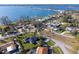 An aerial view captures the home's prime location near the bay at 1103 Palma Sola Blvd, Bradenton, FL 34209