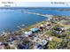 Scenic aerial view showcasing waterfront homes with convenient access to Anna Maria Island and St. Petersburg at 1103 Palma Sola Blvd, Bradenton, FL 34209