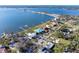 Beautiful waterfront properties with boat docks provide direct access to the bay, located near a scenic coastal bridge at 1103 Palma Sola Blvd, Bradenton, FL 34209