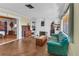 Bright living room featuring a decorative fireplace and stylish decor at 1103 Palma Sola Blvd, Bradenton, FL 34209