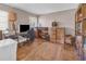 Office space featuring hardwood floors, a large lamp, and a window providing natural light at 1103 Palma Sola Blvd, Bradenton, FL 34209