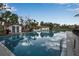 Community pool with a clear reflection and bath house at 1111 W Faith Cir # 2004, Bradenton, FL 34212